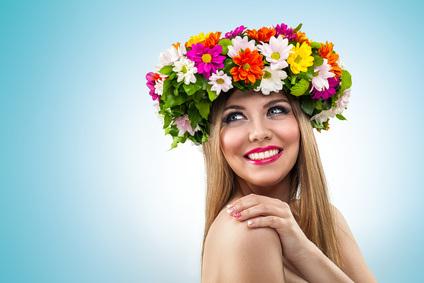 smiling woman with flower wreath