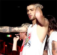 ONE DIRECTION : Zayn Malik wearing 55DSL tank top