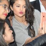 Selena Gomez Poses For Selfies With Her Fans While Visiting NRJ Radio Station