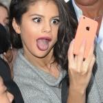 Selena Gomez Poses For Selfies With Her Fans While Visiting NRJ Radio Station
