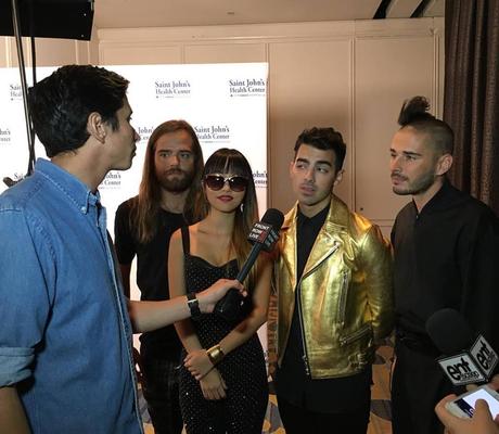 STYLE : Joe Jonas with a gold-toned biker jacket