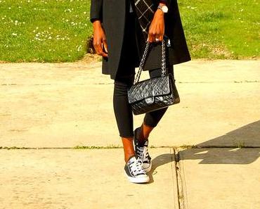Ripped jeans, Chanel bag and Converse