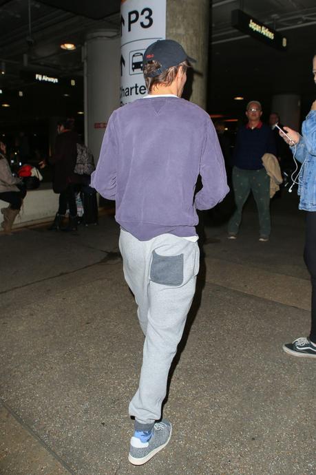STYLE : Louis Tomlinson wearing  a Remi Relief sweatshirt